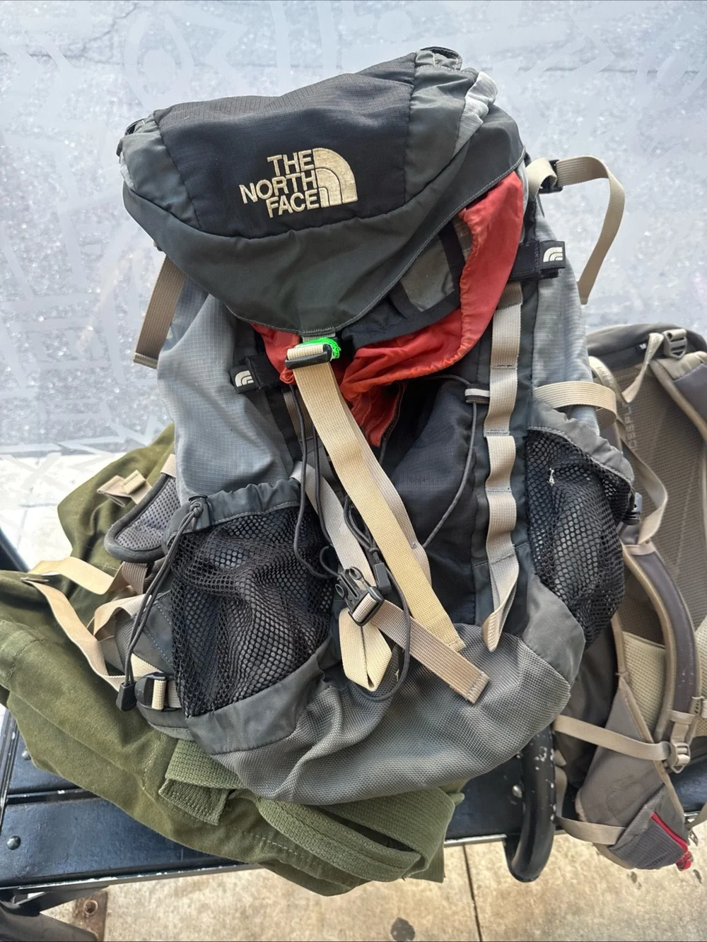 The North Face Gray, Black and Red Hiking Backpack